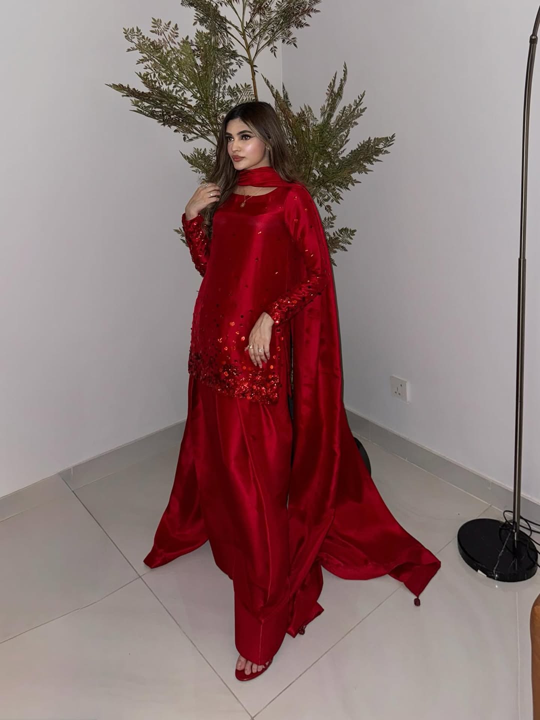 Back side of pure tussle silk shirt with intricate embroidery in ruby red