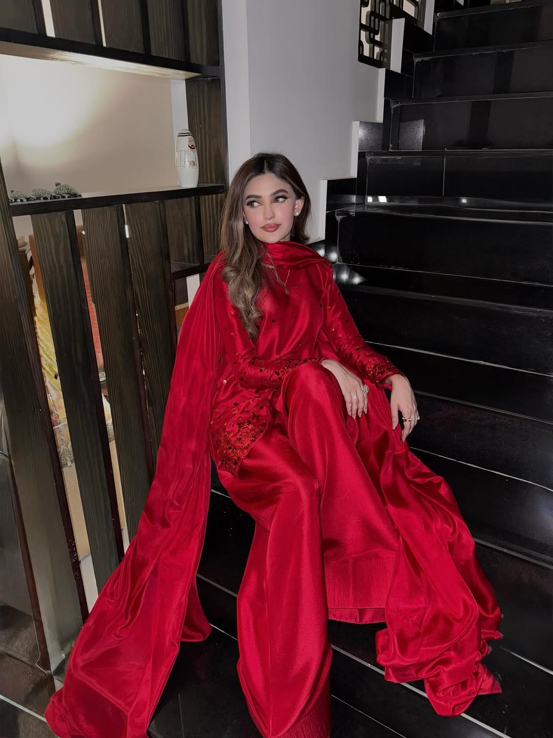 Hand-embellished ruby red tussle silk shirt with detailed embroidery on fron